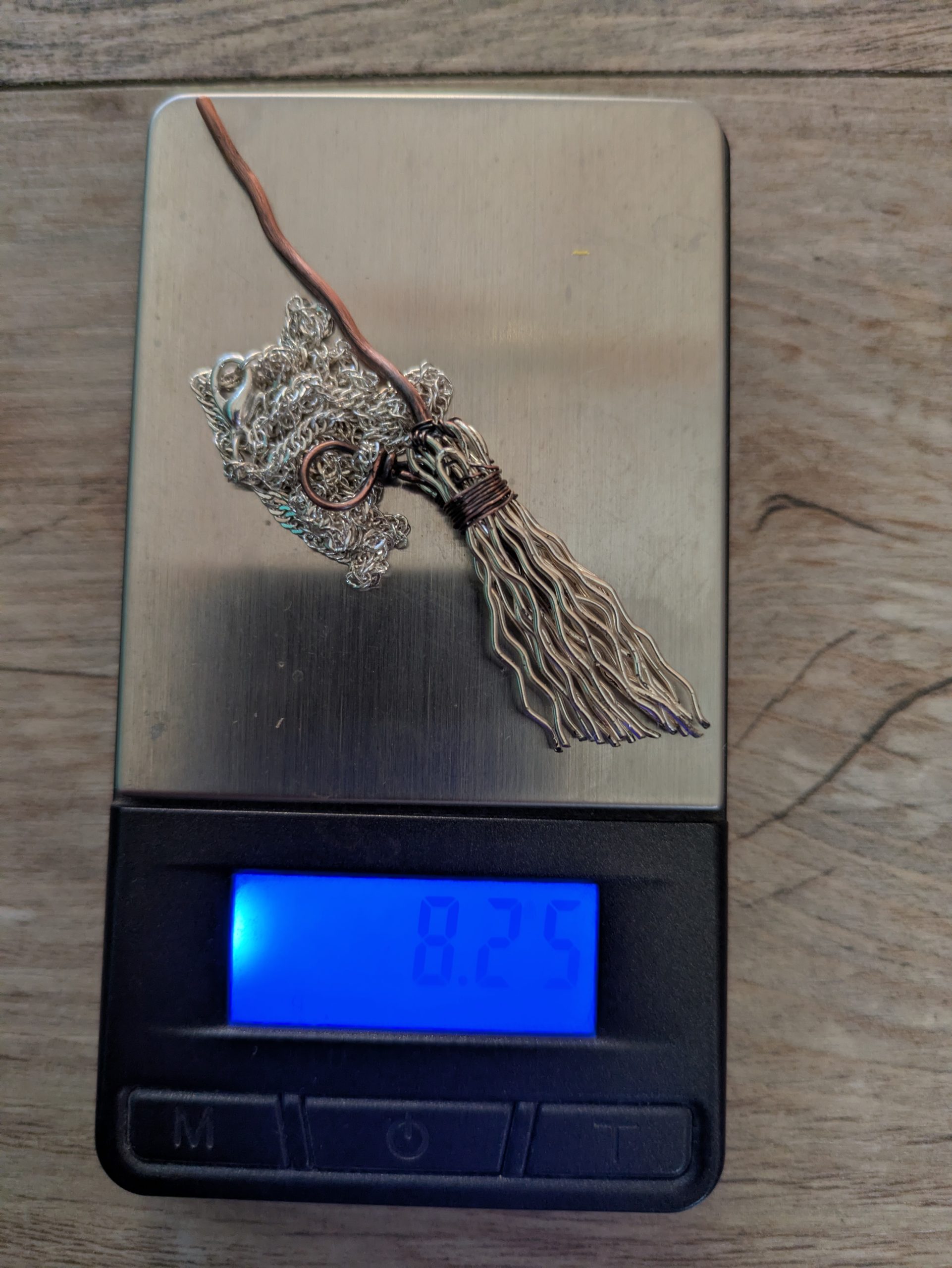 broom pandat with single broom's stick and chain